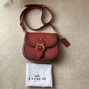 Coach GLVT leather Beat Saddle bag. Red Sand color